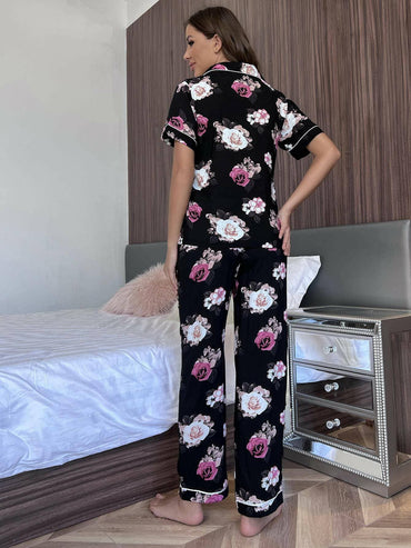 Floral Bliss Lounge Set with Short Sleeve Shirt and PantsUpgrade Your Loungewear with our Floral Bliss Lounge Set
 
 Chic Two-Piece Set: Embrace style and comfort with our floral design ensemble.
 Casual Yet Polished: PerfLove Salve Floral Bliss Lounge Setlounge