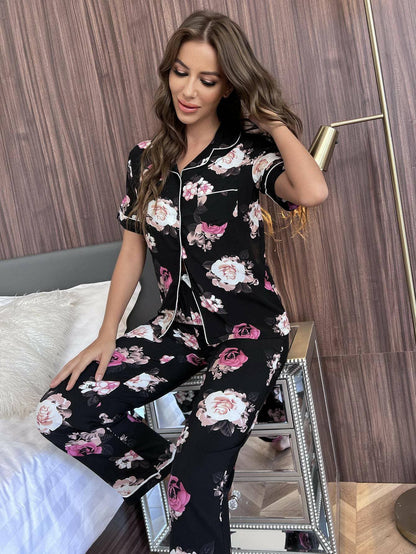 Floral Bliss Lounge Set with Short Sleeve Shirt and PantsUpgrade Your Loungewear with our Floral Bliss Lounge Set
 
 Chic Two-Piece Set: Embrace style and comfort with our floral design ensemble.
 Casual Yet Polished: PerfLove Salve Floral Bliss Lounge Setlounge