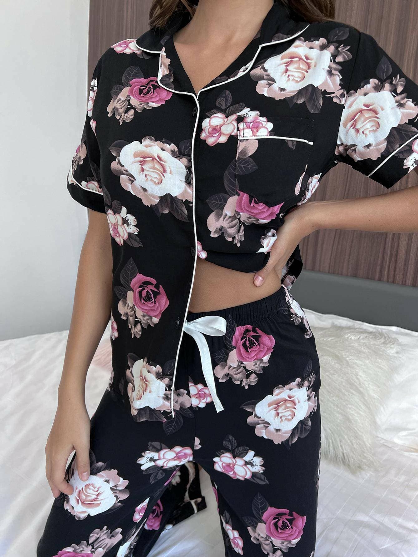 Floral Bliss Lounge Set with Short Sleeve Shirt and PantsUpgrade Your Loungewear with our Floral Bliss Lounge Set
 
 Chic Two-Piece Set: Embrace style and comfort with our floral design ensemble.
 Casual Yet Polished: PerfLove Salve Floral Bliss Lounge Setlounge