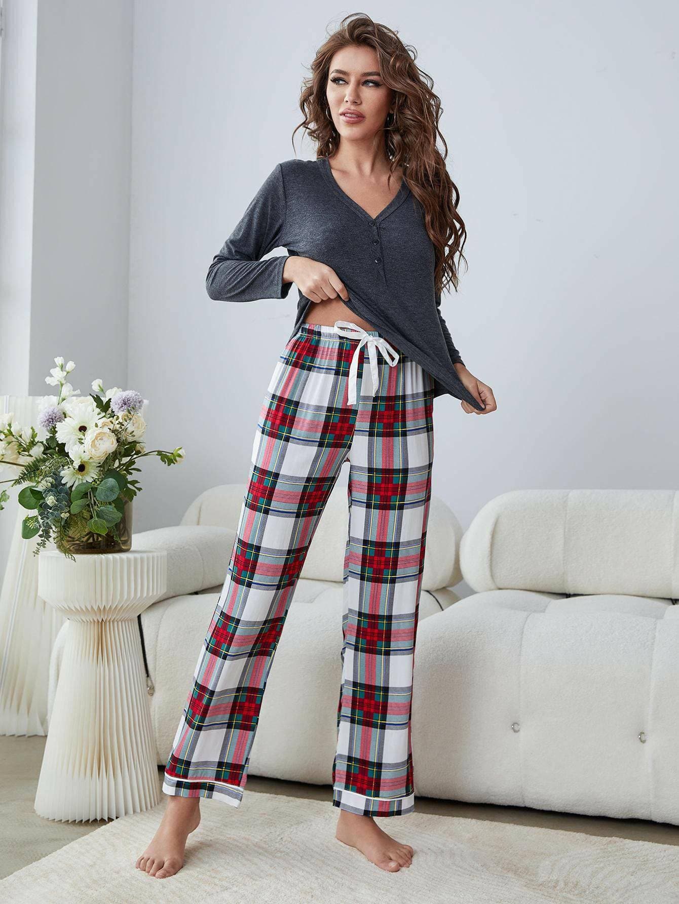 Chic Plaid V-Neck Lounge Set with Buttoned Top and Stylish PantsExperience Effortless Style and Comfort
 
 
Chic Plaid Design: Stand out in style with this chic lounge set featuring a trendy plaid pattern on the stylish pants.
 
Love Salve -Neck Lounge Setlounge