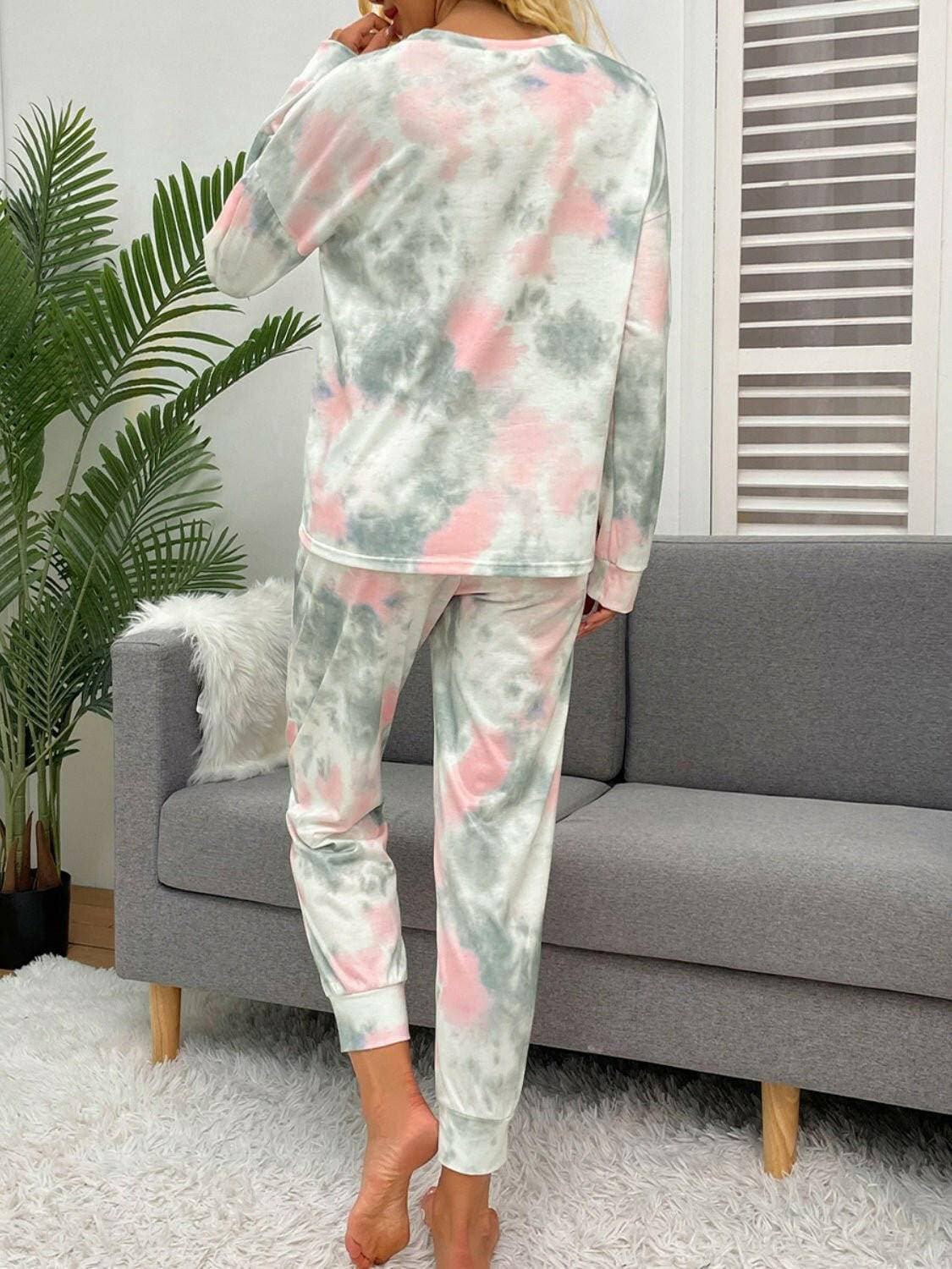 Trendy Tie-Dye Lounge Set with Round Neck Top and Drawstring PantsUpgrade Your Loungewear Collection with Our Trendy Tie-Dye Lounge Set
 Indulge in the perfect blend of comfort and style with our Tie-Dye Lounge Set, comprising a faLove Salve Trendy Tie-Dye Lounge Setlounge