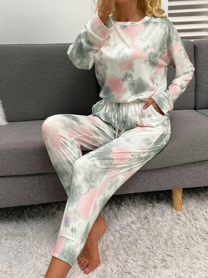 Trendy Tie-Dye Lounge Set with Round Neck Top and Drawstring PantsUpgrade Your Loungewear Collection with Our Trendy Tie-Dye Lounge Set
 Indulge in the perfect blend of comfort and style with our Tie-Dye Lounge Set, comprising a faLove Salve Trendy Tie-Dye Lounge Setlounge