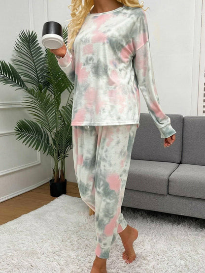 Trendy Tie-Dye Lounge Set with Round Neck Top and Drawstring PantsUpgrade Your Loungewear Collection with Our Trendy Tie-Dye Lounge Set
 Indulge in the perfect blend of comfort and style with our Tie-Dye Lounge Set, comprising a faLove Salve Trendy Tie-Dye Lounge Setlounge