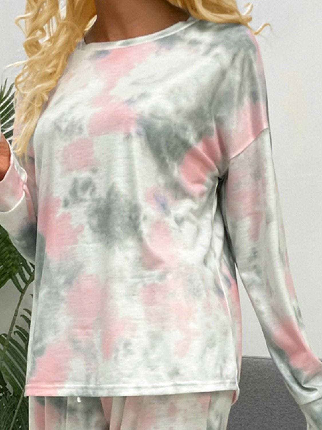 Trendy Tie-Dye Lounge Set with Round Neck Top and Drawstring PantsUpgrade Your Loungewear Collection with Our Trendy Tie-Dye Lounge Set
 Indulge in the perfect blend of comfort and style with our Tie-Dye Lounge Set, comprising a faLove Salve Trendy Tie-Dye Lounge Setlounge