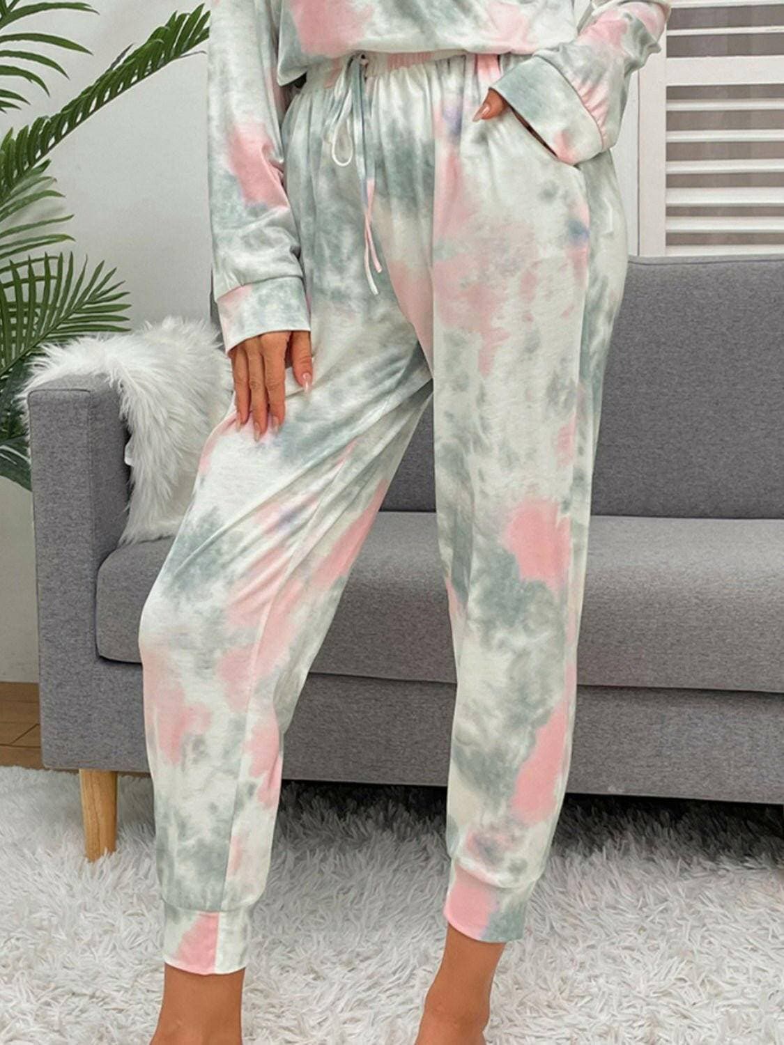 Trendy Tie-Dye Lounge Set with Round Neck Top and Drawstring PantsUpgrade Your Loungewear Collection with Our Trendy Tie-Dye Lounge Set
 Indulge in the perfect blend of comfort and style with our Tie-Dye Lounge Set, comprising a faLove Salve Trendy Tie-Dye Lounge Setlounge