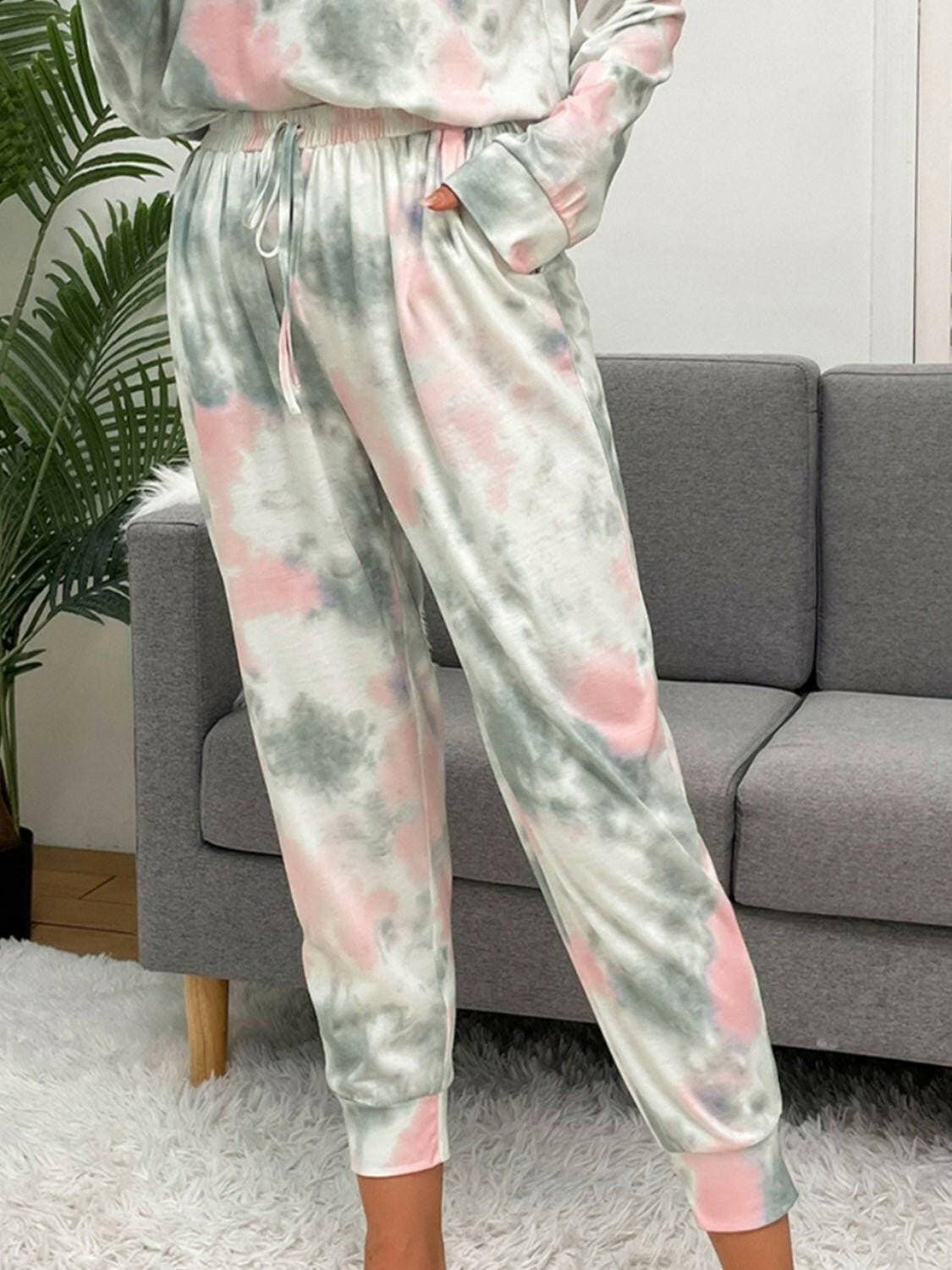 Trendy Tie-Dye Lounge Set with Round Neck Top and Drawstring PantsUpgrade Your Loungewear Collection with Our Trendy Tie-Dye Lounge Set
 Indulge in the perfect blend of comfort and style with our Tie-Dye Lounge Set, comprising a faLove Salve Trendy Tie-Dye Lounge Setlounge