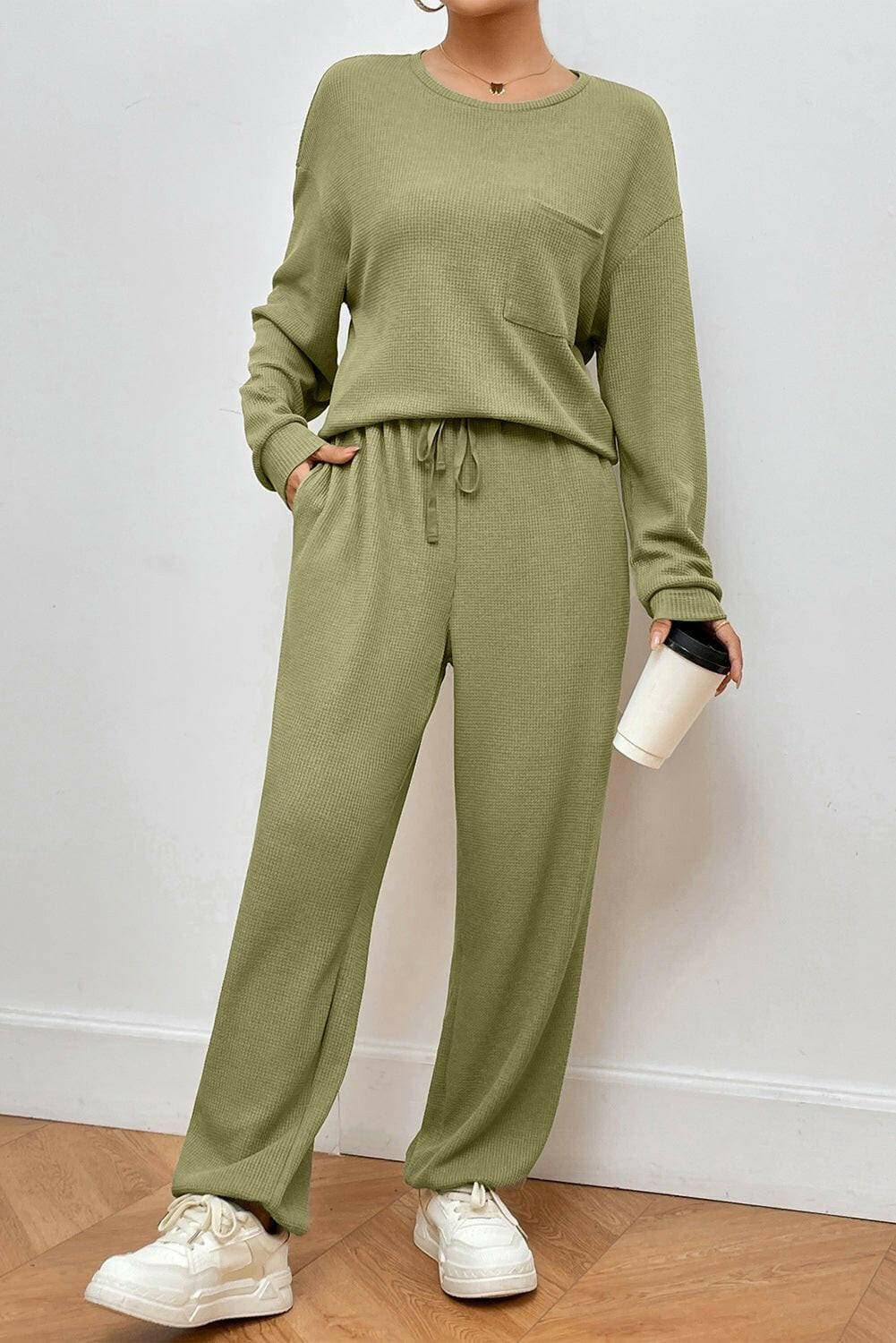 Cozy Lounge Set with Pocketed Two-Piece Top and PantsExperience Ultimate Comfort and Style with Our Cozy Lounge Set
 Unwind in luxury with our stylish Pocketed Round Neck Top and Pants Lounge Set, designed for both relLove Salve Cozy Lounge Setlounge