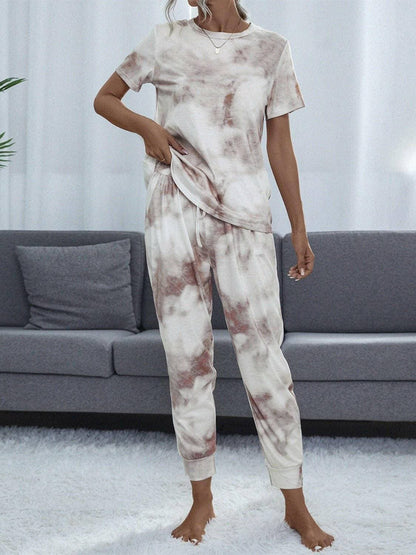 Trendy Tie-Dye Lounge Set with Round Neck Top and BottomsUpgrade Your Loungewear Game with Our Trendy Tie-Dye Lounge Set
 Experience the ultimate blend of style and comfort with our two-piece lounge set featuring a chic tiLove Salve Trendy Tie-Dye Lounge Setlounge