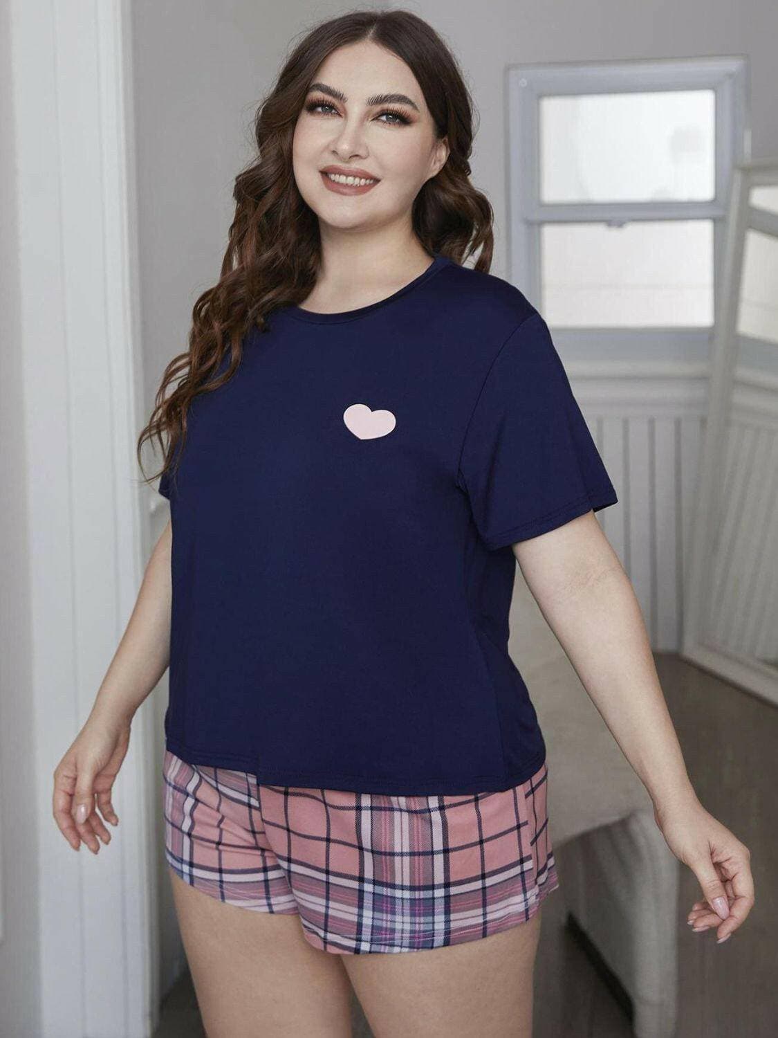 Cozy Heart Print Plus Size Lounge Duo with Plaid ShortsUpgrade Your Loungewear with Style and Comfort
 
 Flatter your curves in this perfectly sized lounge set designed for plus figures
 Chic heart graphic top paired witLove Salve Cozy Heart Printlounge