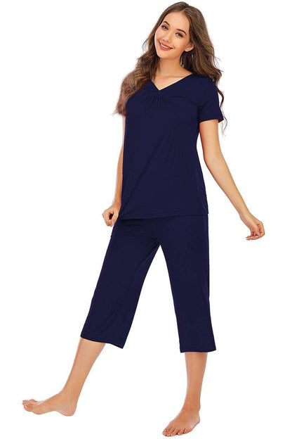 Ultimate Comfort Lounge Set with a Modern TwistExperience Ultimate Comfort with a Modern Twist
 Indulge in luxurious comfort while exuding style with our V-Neck Short Sleeve Top and Pants Lounge Set. Whether you'Love Salve Ultimate Comfort Lounge Setlounge