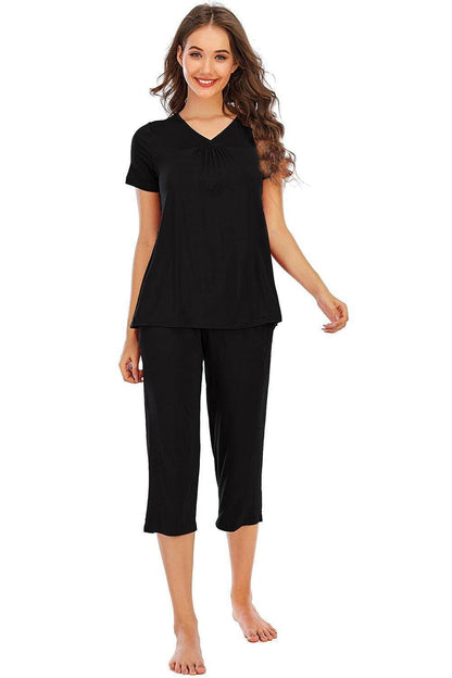 Ultimate Comfort Lounge Set with a Modern TwistExperience Ultimate Comfort with a Modern Twist
 Indulge in luxurious comfort while exuding style with our V-Neck Short Sleeve Top and Pants Lounge Set. Whether you'Love Salve Ultimate Comfort Lounge Setlounge