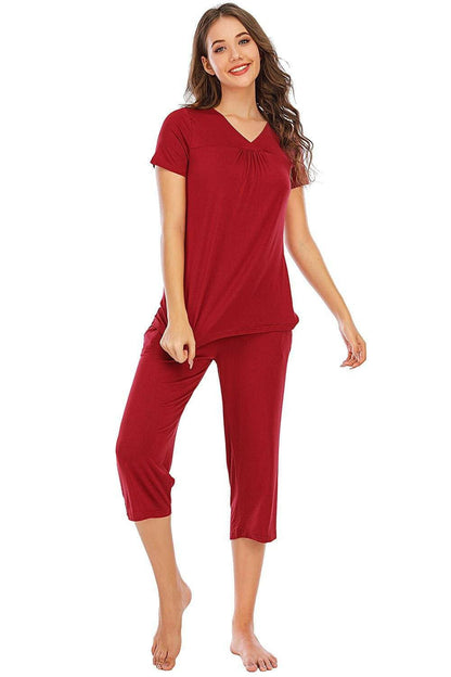 Ultimate Comfort Lounge Set with a Modern TwistExperience Ultimate Comfort with a Modern Twist
 Indulge in luxurious comfort while exuding style with our V-Neck Short Sleeve Top and Pants Lounge Set. Whether you'Love Salve Ultimate Comfort Lounge Setlounge