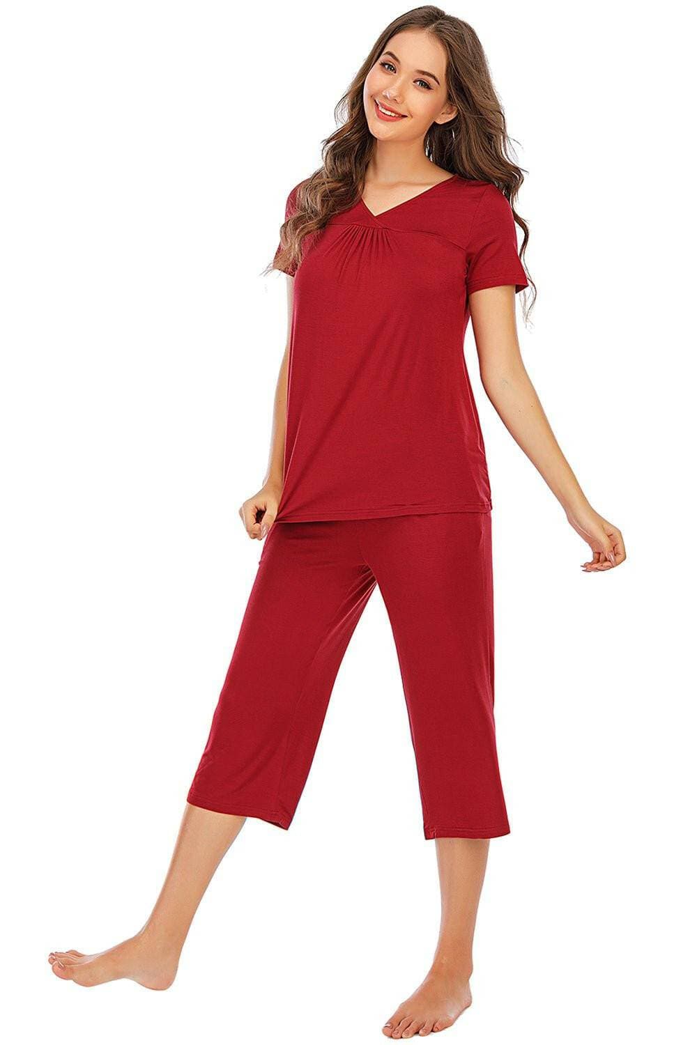 Ultimate Comfort Lounge Set with a Modern TwistExperience Ultimate Comfort with a Modern Twist
 Indulge in luxurious comfort while exuding style with our V-Neck Short Sleeve Top and Pants Lounge Set. Whether you'Love Salve Ultimate Comfort Lounge Setlounge