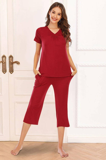 Ultimate Comfort Lounge Set with a Modern TwistExperience Ultimate Comfort with a Modern Twist
 Indulge in luxurious comfort while exuding style with our V-Neck Short Sleeve Top and Pants Lounge Set. Whether you'Love Salve Ultimate Comfort Lounge Setlounge