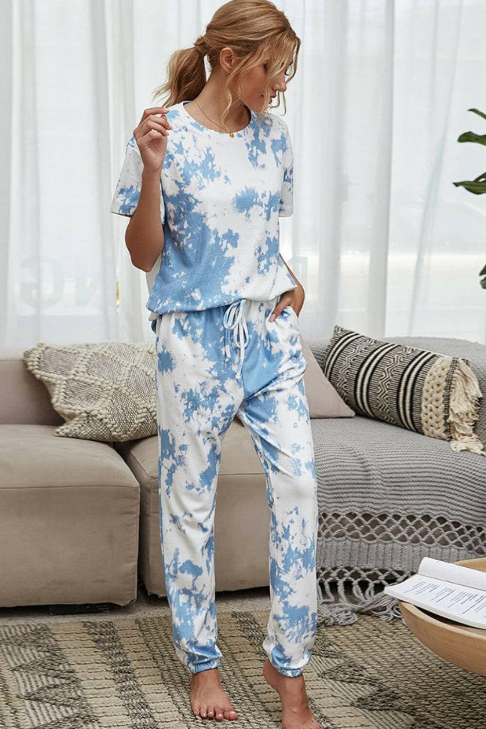 Trendy Tie-Dye Lounge Set with Tee and JoggersTrendy Tie-Dye Lounge Set with Tee and Joggers
 Upgrade your loungewear game with this standout two-piece set that combines style and comfort seamlessly.
 
 Key FeatLove Salve Trendy Tie-Dye Lounge Setlounge