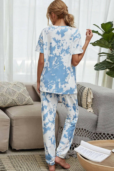 Trendy Tie-Dye Lounge Set with Tee and JoggersTrendy Tie-Dye Lounge Set with Tee and Joggers
 Upgrade your loungewear game with this standout two-piece set that combines style and comfort seamlessly.
 
 Key FeatLove Salve Trendy Tie-Dye Lounge Setlounge