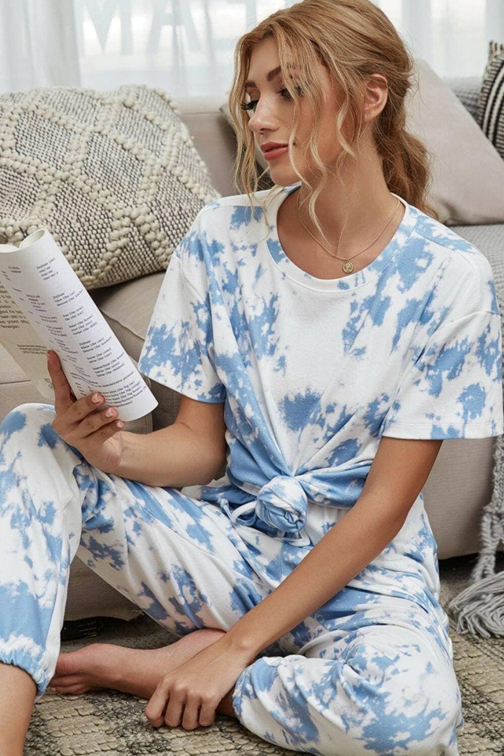 Trendy Tie-Dye Lounge Set with Tee and JoggersTrendy Tie-Dye Lounge Set with Tee and Joggers
 Upgrade your loungewear game with this standout two-piece set that combines style and comfort seamlessly.
 
 Key FeatLove Salve Trendy Tie-Dye Lounge Setlounge