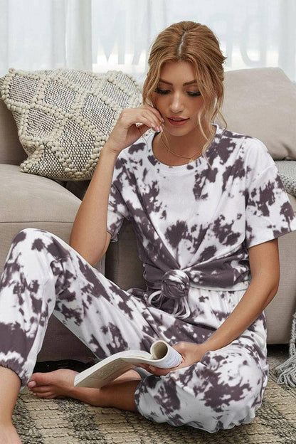 Trendy Tie-Dye Lounge Set with Tee and JoggersTrendy Tie-Dye Lounge Set with Tee and Joggers
 Upgrade your loungewear game with this standout two-piece set that combines style and comfort seamlessly.
 
 Key FeatLove Salve Trendy Tie-Dye Lounge Setlounge