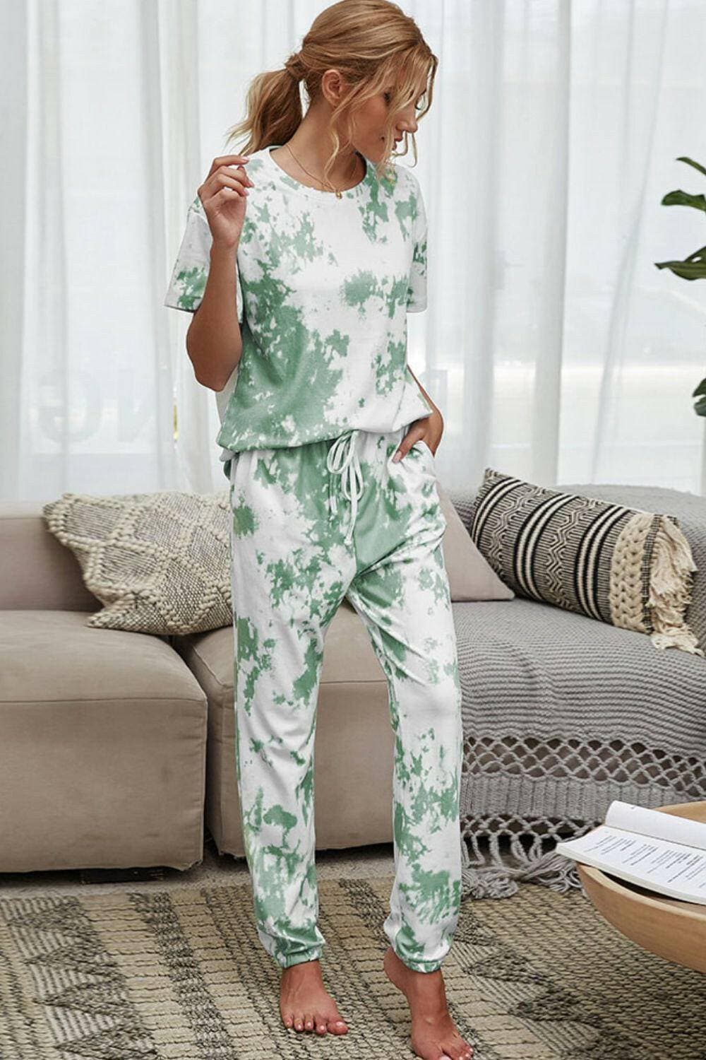 Trendy Tie-Dye Lounge Set with Tee and JoggersTrendy Tie-Dye Lounge Set with Tee and Joggers
 Upgrade your loungewear game with this standout two-piece set that combines style and comfort seamlessly.
 
 Key FeatLove Salve Trendy Tie-Dye Lounge Setlounge