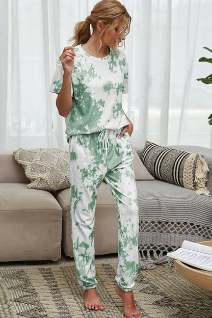 Trendy Tie-Dye Lounge Set with Tee and JoggersTrendy Tie-Dye Lounge Set with Tee and Joggers
 Upgrade your loungewear game with this standout two-piece set that combines style and comfort seamlessly.
 
 Key FeatLove Salve Trendy Tie-Dye Lounge Setlounge