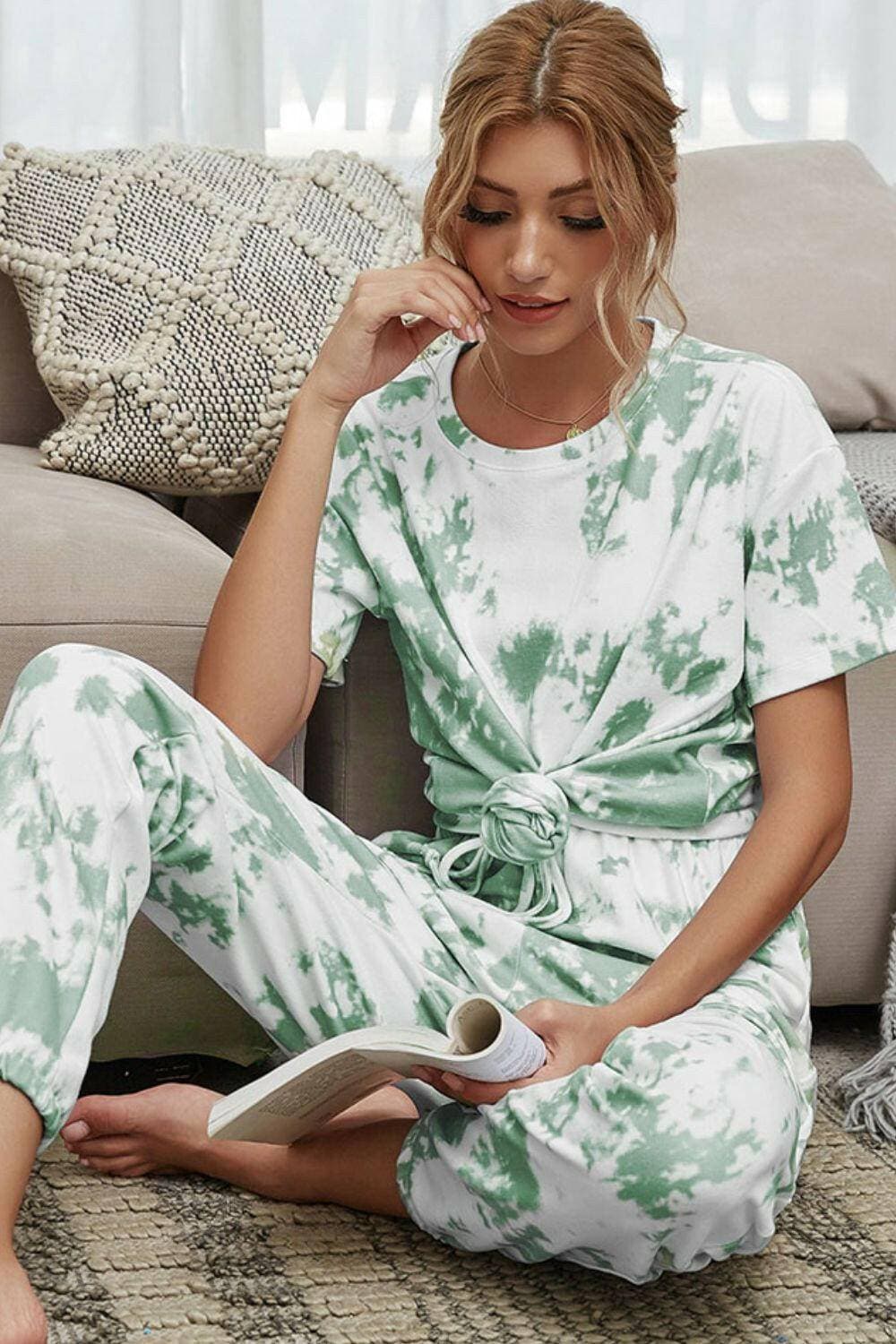 Trendy Tie-Dye Lounge Set with Tee and JoggersTrendy Tie-Dye Lounge Set with Tee and Joggers
 Upgrade your loungewear game with this standout two-piece set that combines style and comfort seamlessly.
 
 Key FeatLove Salve Trendy Tie-Dye Lounge Setlounge