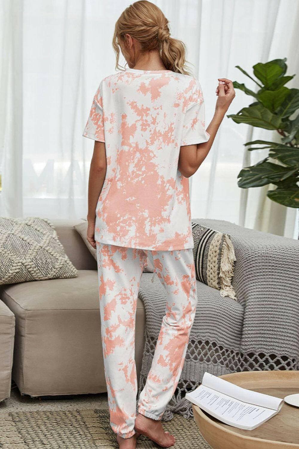 Trendy Tie-Dye Lounge Set with Tee and JoggersTrendy Tie-Dye Lounge Set with Tee and Joggers
 Upgrade your loungewear game with this standout two-piece set that combines style and comfort seamlessly.
 
 Key FeatLove Salve Trendy Tie-Dye Lounge Setlounge