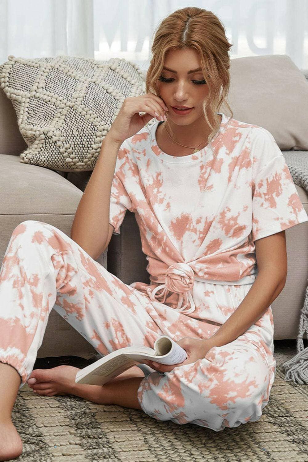 Trendy Tie-Dye Lounge Set with Tee and JoggersTrendy Tie-Dye Lounge Set with Tee and Joggers
 Upgrade your loungewear game with this standout two-piece set that combines style and comfort seamlessly.
 
 Key FeatLove Salve Trendy Tie-Dye Lounge Setlounge