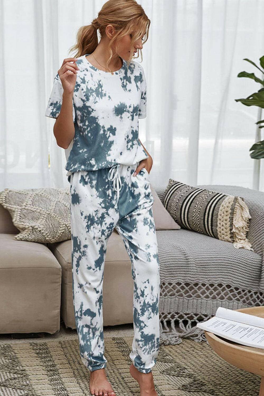 Trendy Tie-Dye Lounge Set with Tee and JoggersTrendy Tie-Dye Lounge Set with Tee and Joggers
 Upgrade your loungewear game with this standout two-piece set that combines style and comfort seamlessly.
 
 Key FeatLove Salve Trendy Tie-Dye Lounge Setlounge