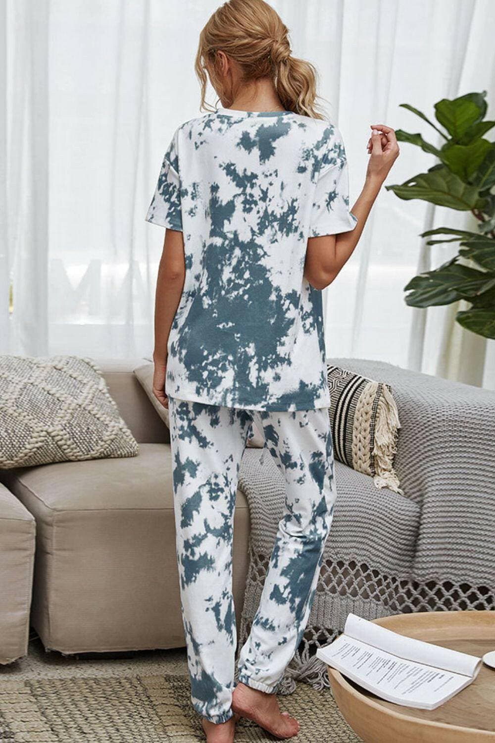 Trendy Tie-Dye Lounge Set with Tee and JoggersTrendy Tie-Dye Lounge Set with Tee and Joggers
 Upgrade your loungewear game with this standout two-piece set that combines style and comfort seamlessly.
 
 Key FeatLove Salve Trendy Tie-Dye Lounge Setlounge