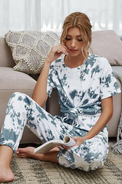 Trendy Tie-Dye Lounge Set with Tee and JoggersTrendy Tie-Dye Lounge Set with Tee and Joggers
 Upgrade your loungewear game with this standout two-piece set that combines style and comfort seamlessly.
 
 Key FeatLove Salve Trendy Tie-Dye Lounge Setlounge