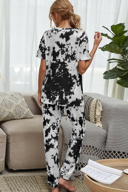 Trendy Tie-Dye Lounge Set with Tee and JoggersTrendy Tie-Dye Lounge Set with Tee and Joggers
 Upgrade your loungewear game with this standout two-piece set that combines style and comfort seamlessly.
 
 Key FeatLove Salve Trendy Tie-Dye Lounge Setlounge