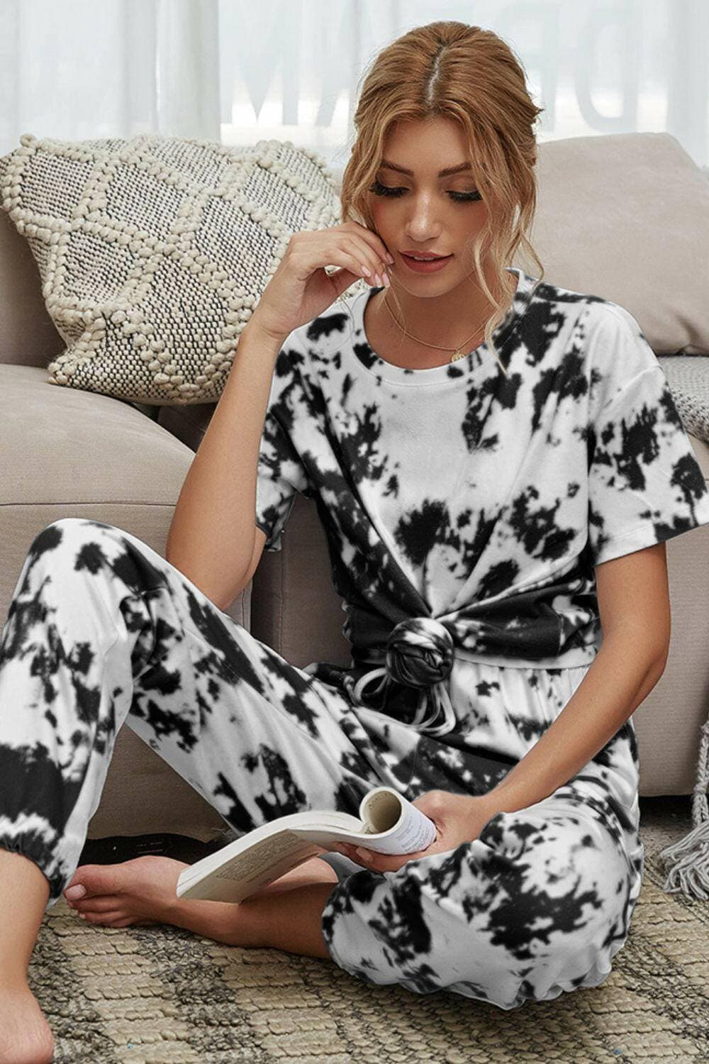 Trendy Tie-Dye Lounge Set with Tee and JoggersTrendy Tie-Dye Lounge Set with Tee and Joggers
 Upgrade your loungewear game with this standout two-piece set that combines style and comfort seamlessly.
 
 Key FeatLove Salve Trendy Tie-Dye Lounge Setlounge