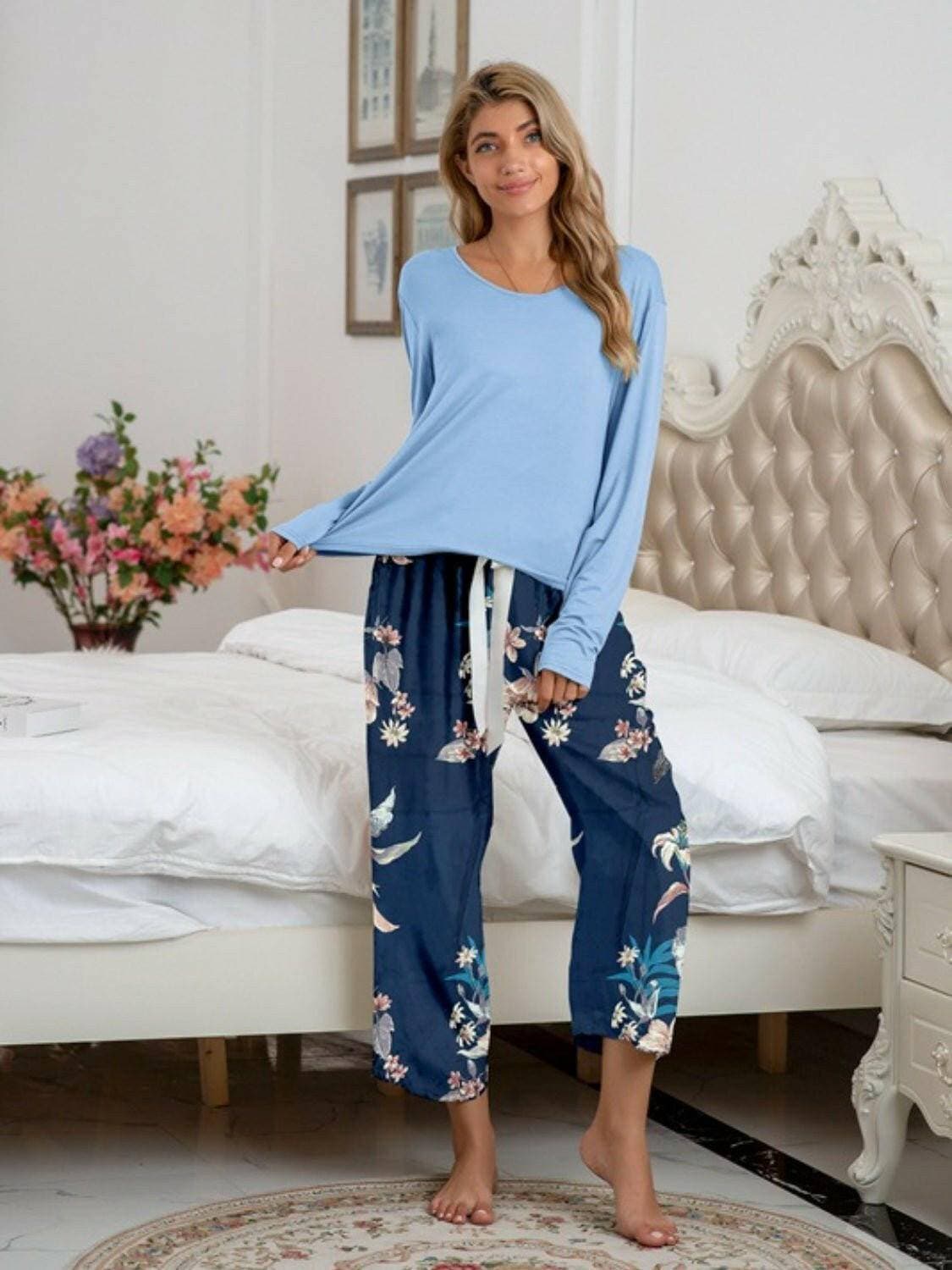 Stylish Comfort Lounge Set with Round Neck Top and Printed PantsUpgrade Your Loungewear Game
 Introducing our Comfort Chic Lounge Wear Set, the perfect blend of style and comfort for your everyday relaxation. This set includes a Love Salve Stylish Comfort Lounge Setlounge