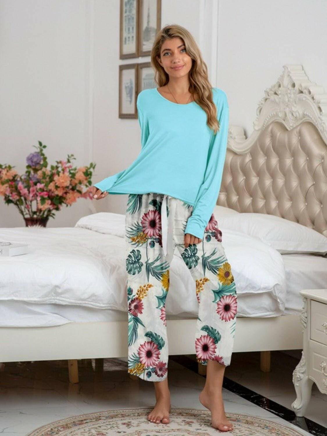 Stylish Comfort Lounge Set with Round Neck Top and Printed PantsUpgrade Your Loungewear Game
 Introducing our Comfort Chic Lounge Wear Set, the perfect blend of style and comfort for your everyday relaxation. This set includes a Love Salve Stylish Comfort Lounge Setlounge