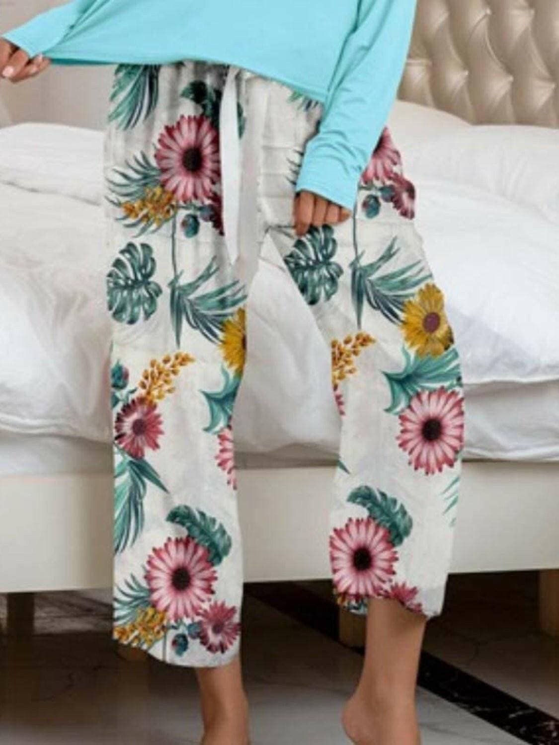 Stylish Comfort Lounge Set with Round Neck Top and Printed PantsUpgrade Your Loungewear Game
 Introducing our Comfort Chic Lounge Wear Set, the perfect blend of style and comfort for your everyday relaxation. This set includes a Love Salve Stylish Comfort Lounge Setlounge