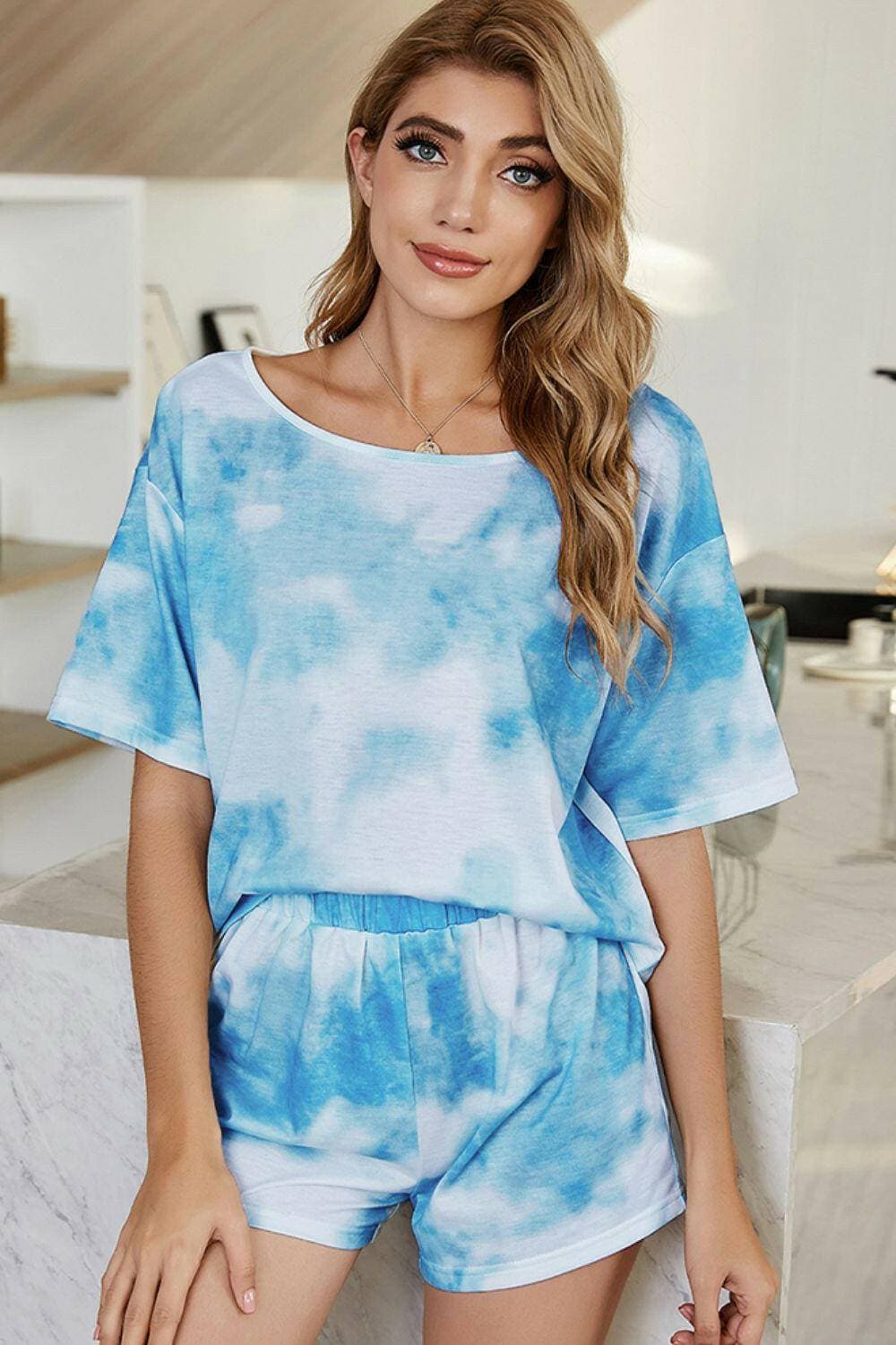 Trendy Tie-Dye Boat Neck Lounge Set: Chic Two-Piece Loungewear EnsemblUnwind in Style with Our Trendy Tie-Dye Boat Neck Lounge Set
 Elevate your loungewear game with our chic and comfortable two-piece ensemble, the Trendy Tie-Dye Boat Love Salve Trendy Tie-Dye Boat Neck Lounge Setlounge