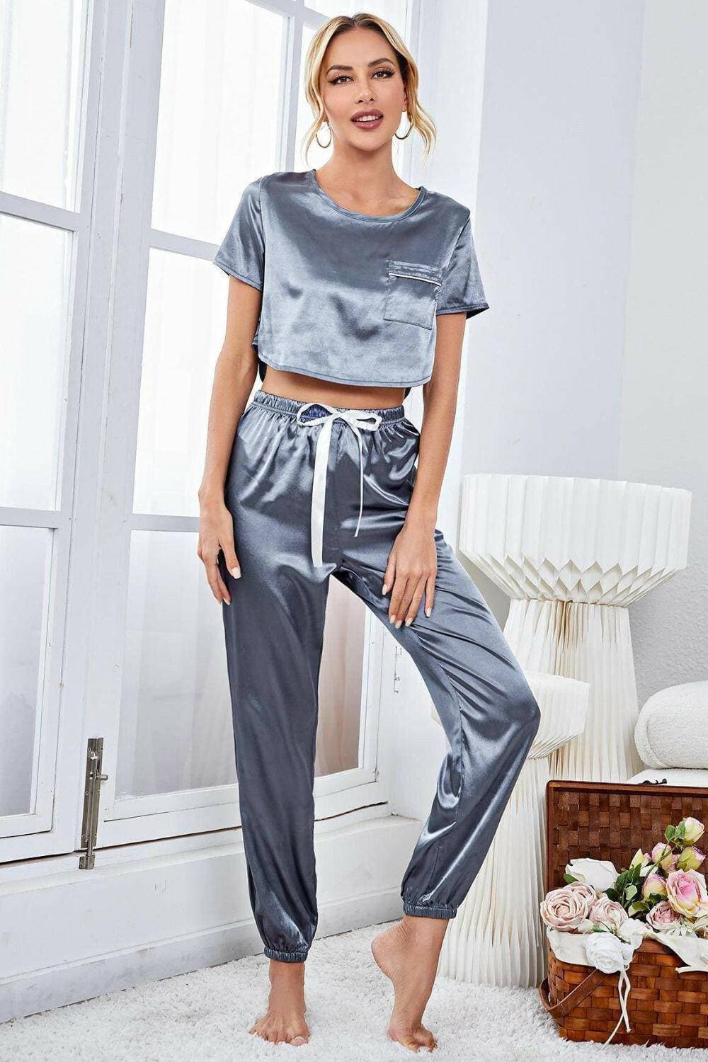 Sleek Satin Lounge Ensemble with Crop Top and JoggersSleek Satin Lounge Ensemble with Crop Top and Joggers
 Upgrade your loungewear collection with our chic and coordinated Sleek Satin Lounge Ensemble.
 
 
Elevated StyLove Salve Sleek Satin Lounge Ensemblelounge