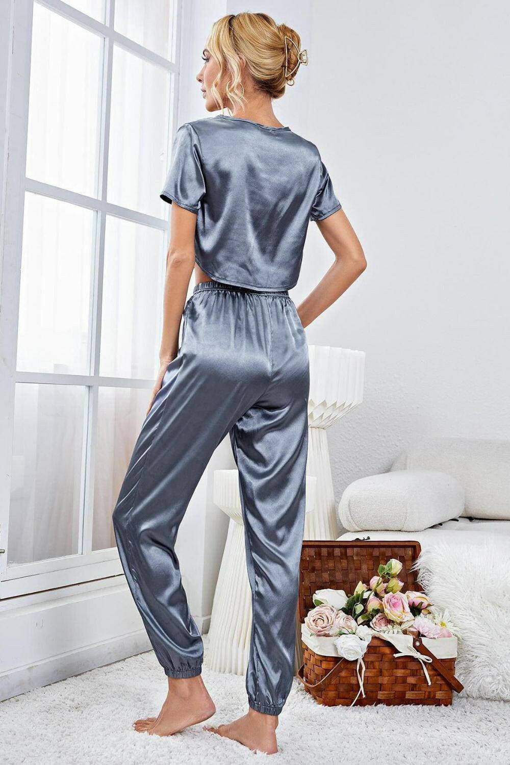 Sleek Satin Lounge Ensemble with Crop Top and JoggersSleek Satin Lounge Ensemble with Crop Top and Joggers
 Upgrade your loungewear collection with our chic and coordinated Sleek Satin Lounge Ensemble.
 
 
Elevated StyLove Salve Sleek Satin Lounge Ensemblelounge