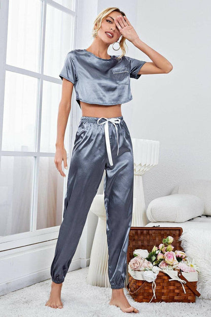 Sleek Satin Lounge Ensemble with Crop Top and JoggersSleek Satin Lounge Ensemble with Crop Top and Joggers
 Upgrade your loungewear collection with our chic and coordinated Sleek Satin Lounge Ensemble.
 
 
Elevated StyLove Salve Sleek Satin Lounge Ensemblelounge