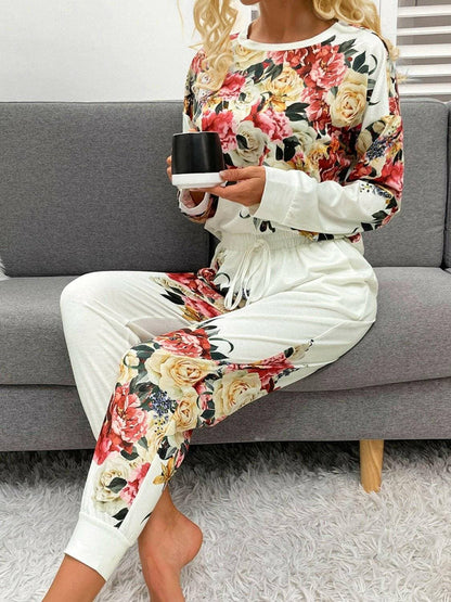 Cozy Printed Lounge Set with Round Neck Top and Pants - Fashionable LoCozy Printed Lounge Set with Round Neck Top and Pants - Fashionable Loungewear Ensemble
 Indulge in luxury comfort with our Cozy Printed Lounge Set featuring a roundLove Salve Cozy Printed Lounge Setlounge