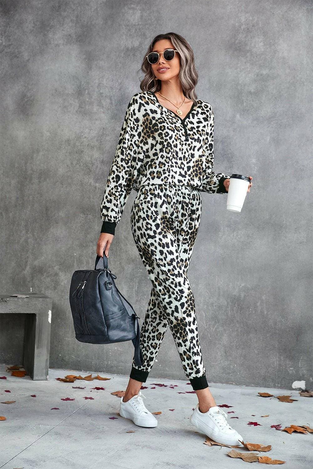 Leopard Print V-Neck Lounge Set with Dropped Shoulder EleganceLeopard Print V-Neck Lounge Set with Dropped Shoulder Elegance
 
 
Chic Leopard Print: Make a stylish statement with the elegant leopard pattern.
 
Cozy Relaxation: Love Salve -Neck Lounge Setlounge