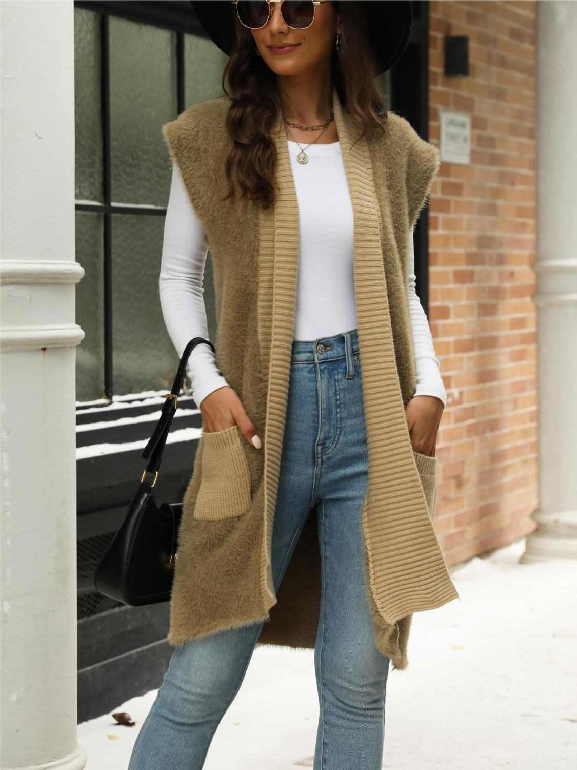 Chic pocketed cap sleeve cardigan with front pockets, ideal for layering.