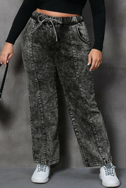 Plus size adjustable drawstring jeans with straight leg style.