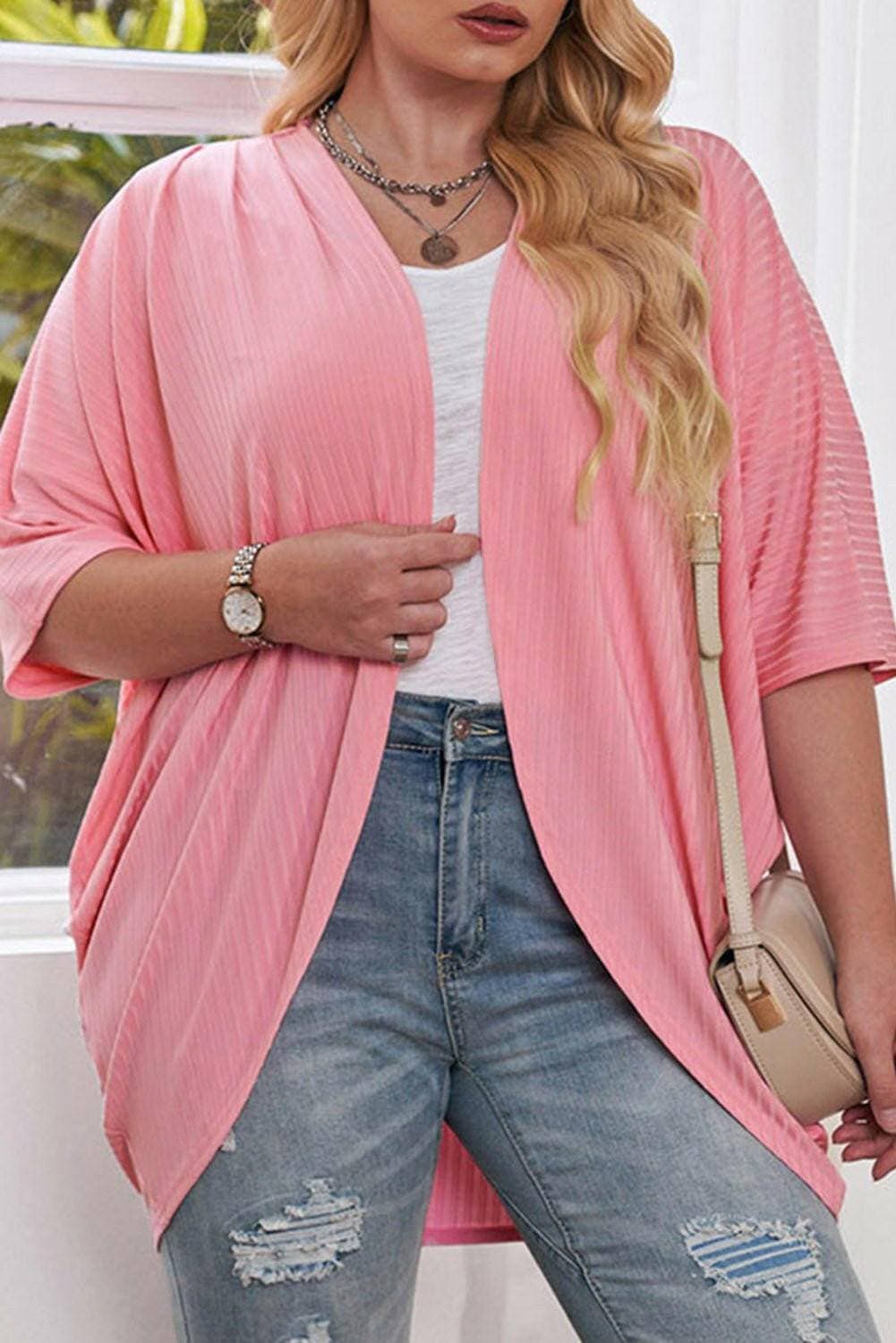 Ribbed Cocoon Plus Size Sheer Cover-UpUpgrade Your Poolside Glam with the Ribbed Cocoon Plus Size Sheer Cover-Up
 
 
Style: Elevate your beach look with this chic and versatile cover-up.
 
Sheer: The perLove Salve Size Sheer Cover-plus