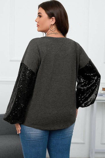 Shimmering Curve Embrace V-Neck Top with Long SleevesExperience Elegance and Comfort
 Indulge in the allure of our Shimmering Curve Embrace V-Neck Top with Long Sleeves. This exquisite top combines style and comfort seLove Salve Shimmering Curve Embraceplus