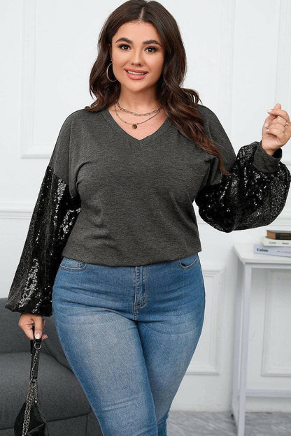 Shimmering Curve Embrace V-Neck Top with Long SleevesExperience Elegance and Comfort
 Indulge in the allure of our Shimmering Curve Embrace V-Neck Top with Long Sleeves. This exquisite top combines style and comfort seLove Salve Shimmering Curve Embraceplus