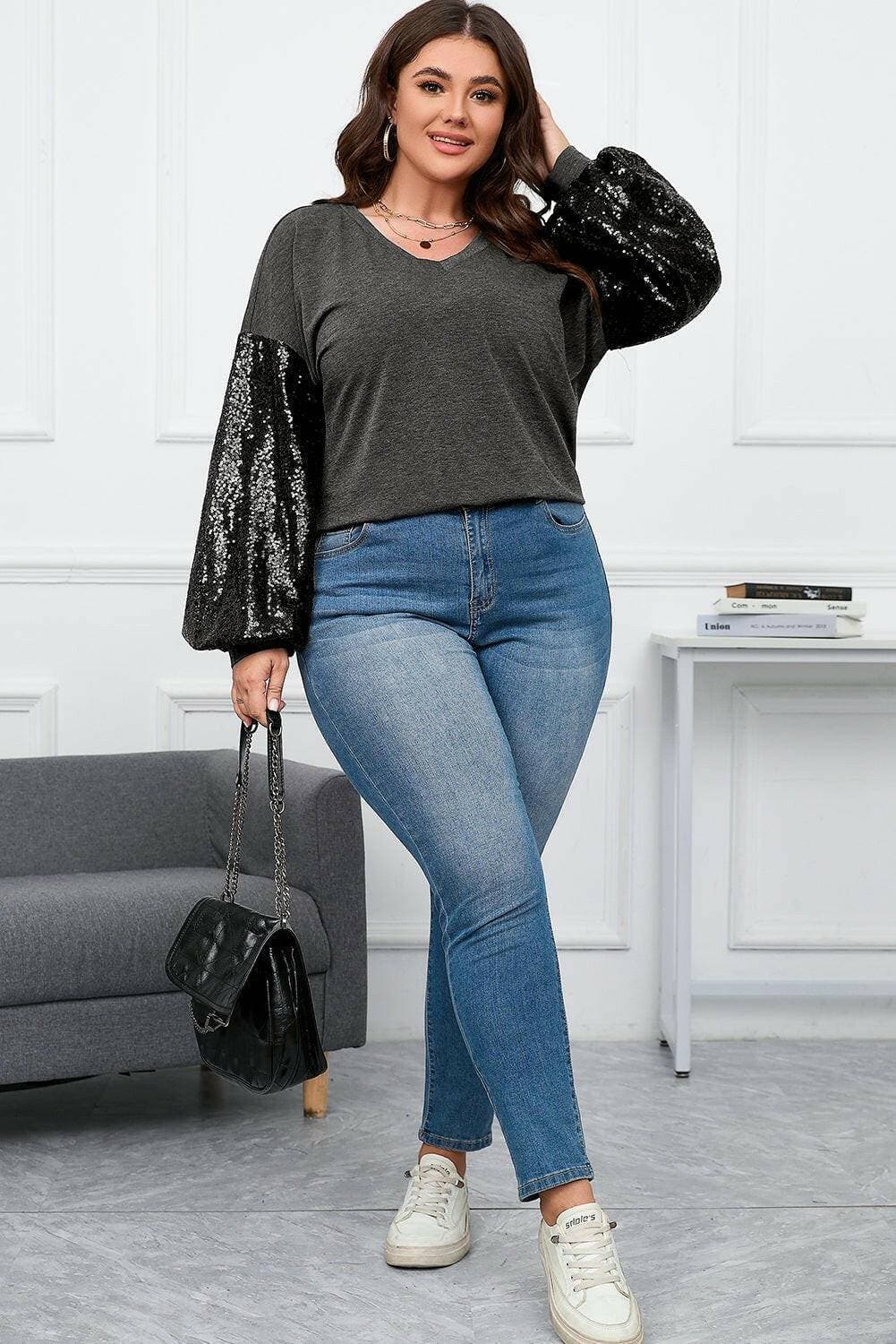 Shimmering Curve Embrace V-Neck Top with Long SleevesExperience Elegance and Comfort
 Indulge in the allure of our Shimmering Curve Embrace V-Neck Top with Long Sleeves. This exquisite top combines style and comfort seLove Salve Shimmering Curve Embraceplus