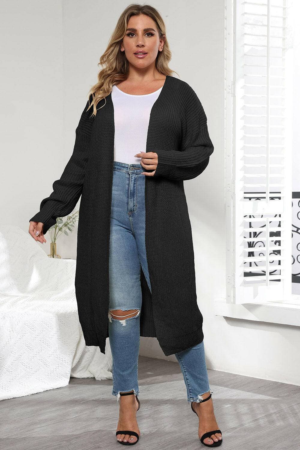 Cozy Oversized Knit CardiganWrap Yourself in Ultimate Comfort with Our Cozy Oversized Knit Cardigan
 Indulge in the luxurious warmth and style of our Cozy Oversized Knit Cardigan. Crafted from Love Salve Cozy Oversized Knit Cardiganplus