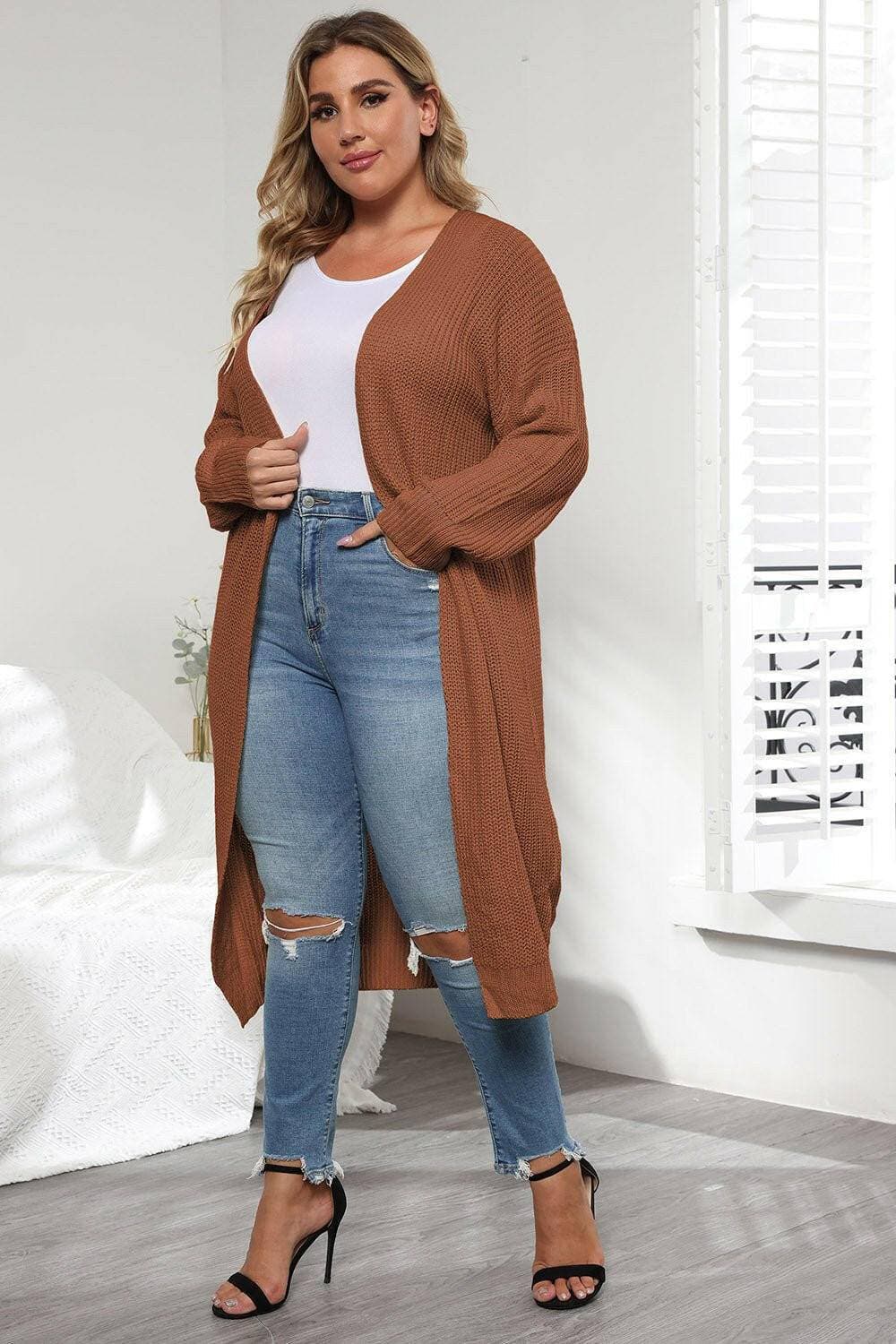 Cozy Oversized Knit CardiganWrap Yourself in Ultimate Comfort with Our Cozy Oversized Knit Cardigan
 Indulge in the luxurious warmth and style of our Cozy Oversized Knit Cardigan. Crafted from Love Salve Cozy Oversized Knit Cardiganplus