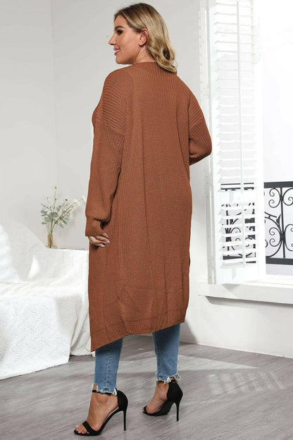 Cozy Oversized Knit CardiganWrap Yourself in Ultimate Comfort with Our Cozy Oversized Knit Cardigan
 Indulge in the luxurious warmth and style of our Cozy Oversized Knit Cardigan. Crafted from Love Salve Cozy Oversized Knit Cardiganplus